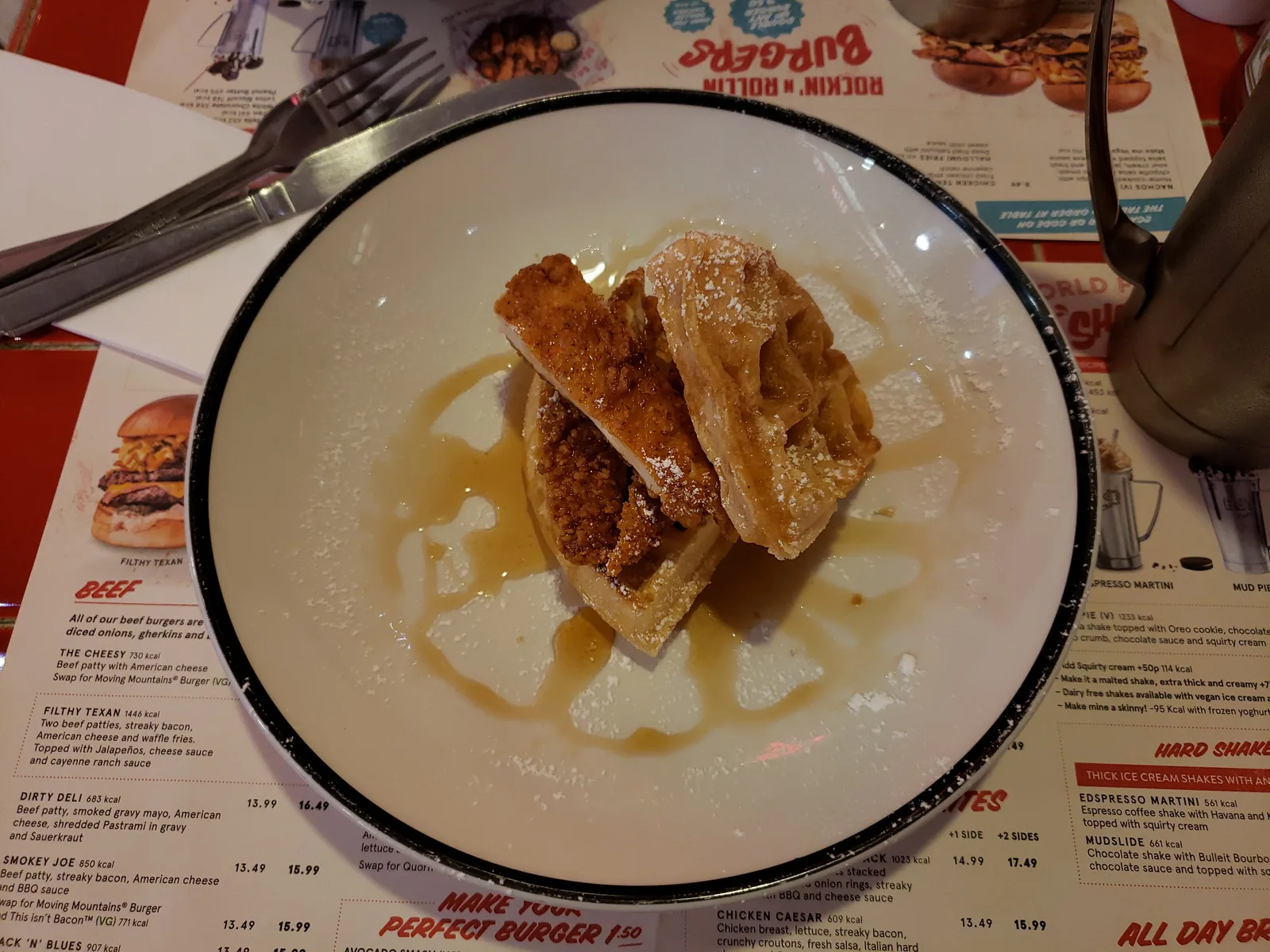 A plate of fried chicken and waffles at Ed's Easy Diner.