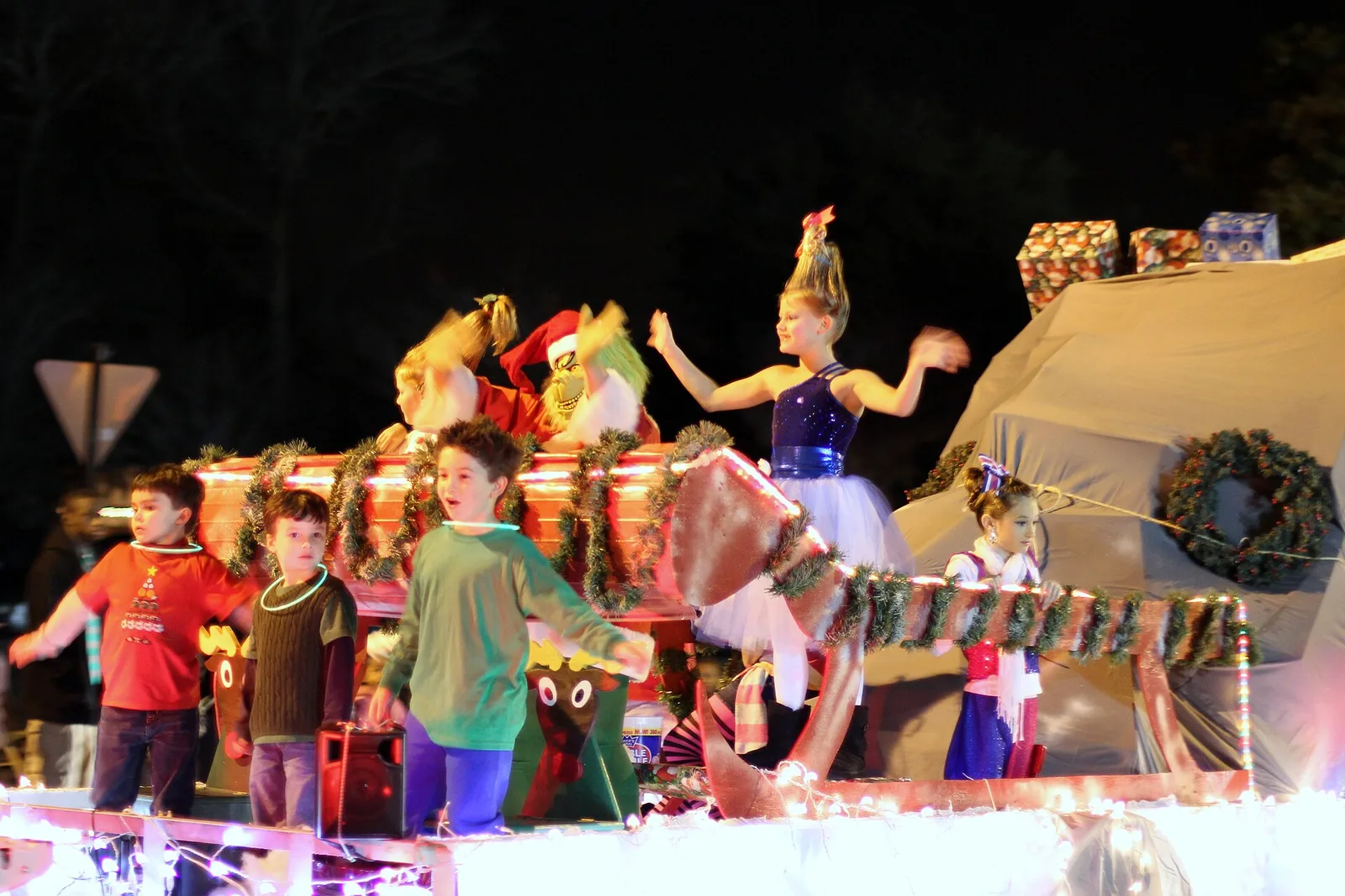 Children in costume ride a decorated float in the North Charleston Christmas Parade in South Carolina.