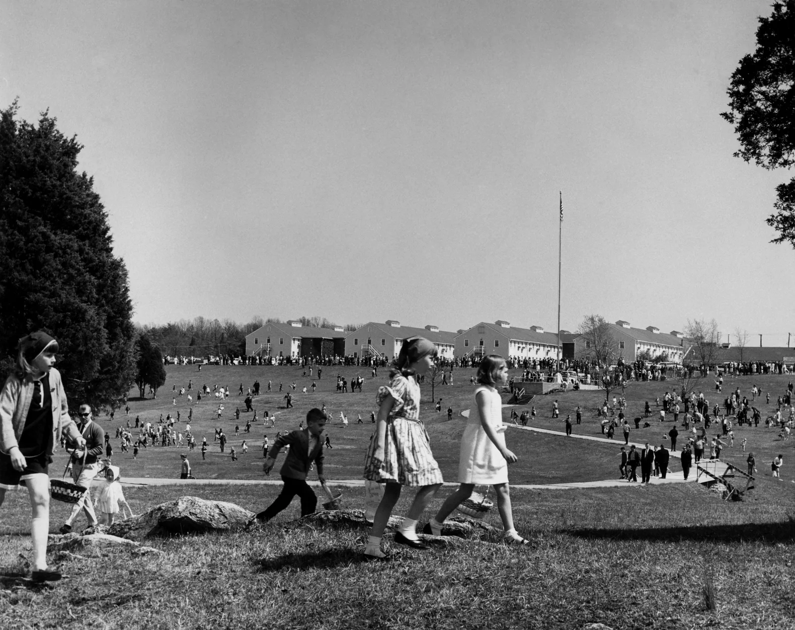 Children gather eggs on the lawn at an Easter egg hunt in Oak Ridge, Tenn.
