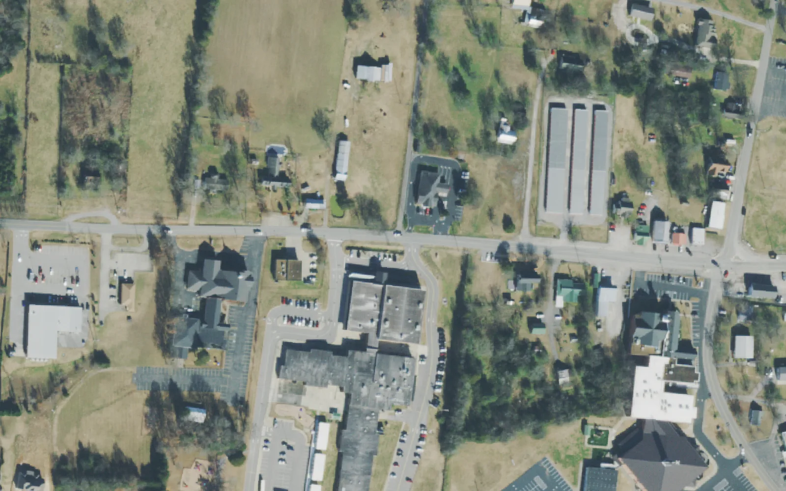 Gladeville Elementary School's building and the crossroads around it on Stewarts Ferry Pike in Gladeville, seen from the air.