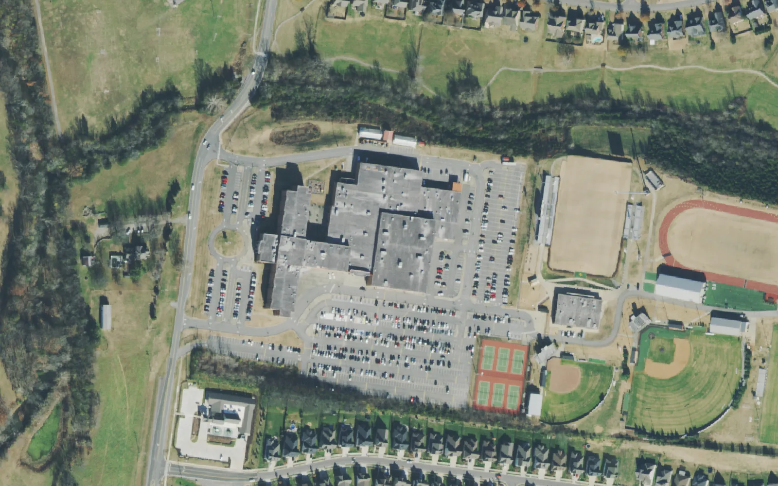 Mt. Juliet High School's main building, track, ball fields and tennis courts off Golden Bear Gateway in Mount Juliet, seen from the air.